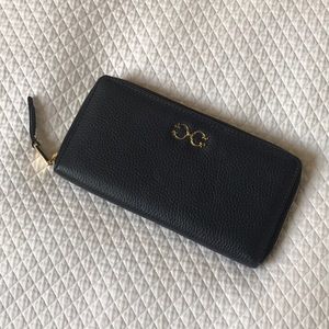 C. Wonder Signature Leather Navy Blue Zip Wallet